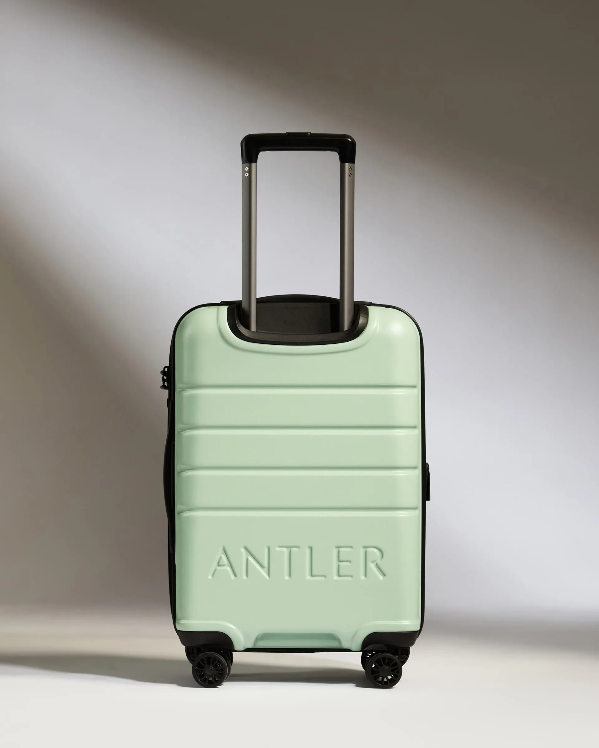 Expandable Cabin Suitcase in Aspen Green - Logo
