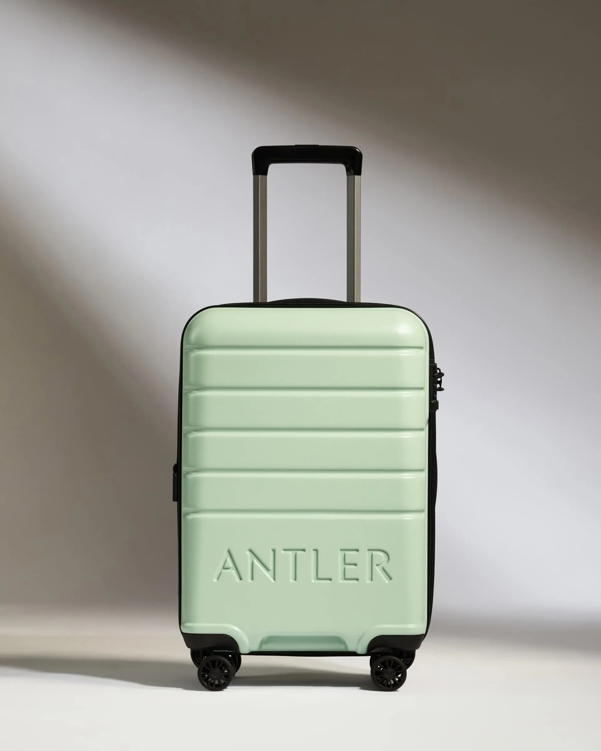 Expandable Cabin Suitcase in Aspen Green - Logo