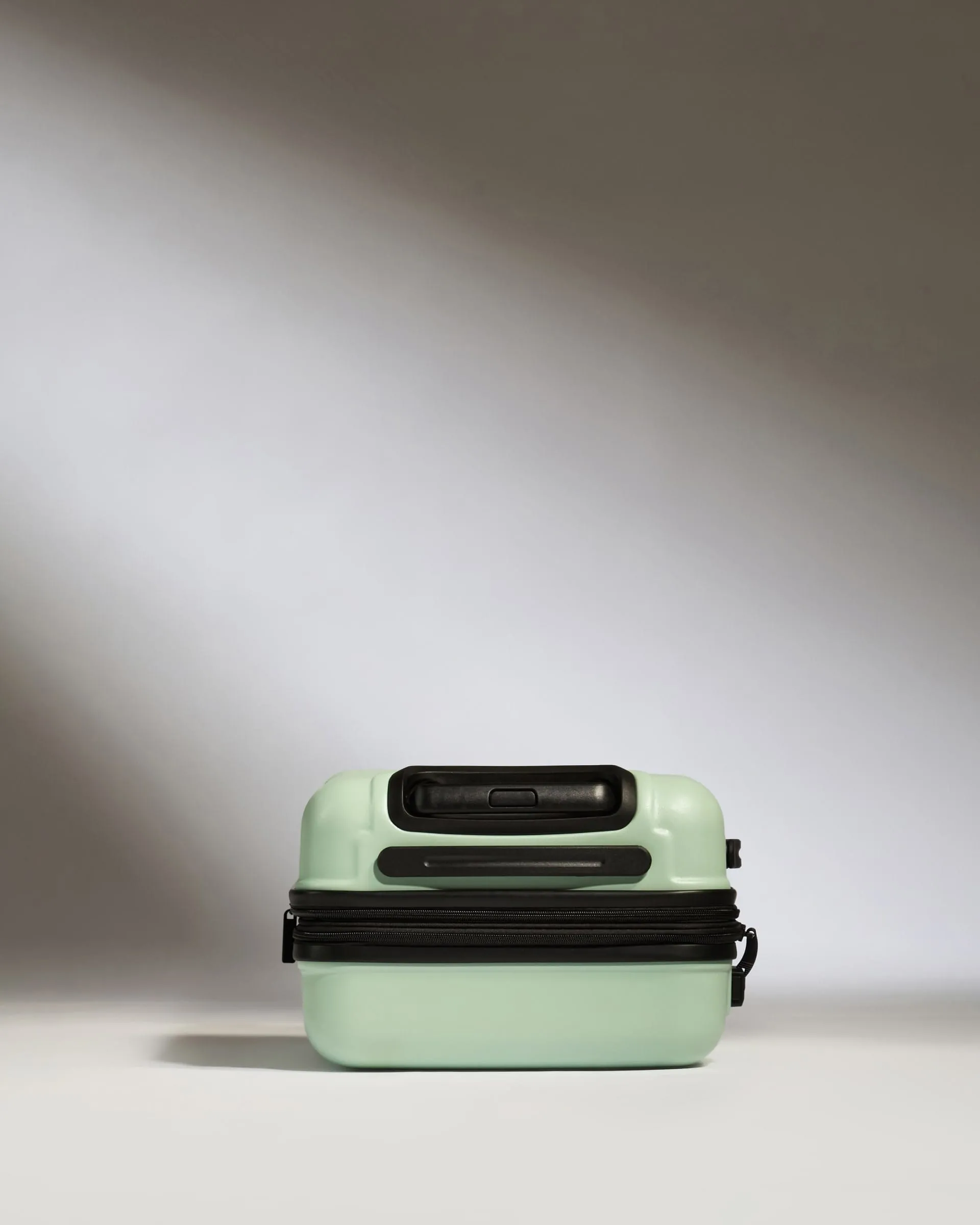 Expandable Cabin Suitcase in Aspen Green - Logo