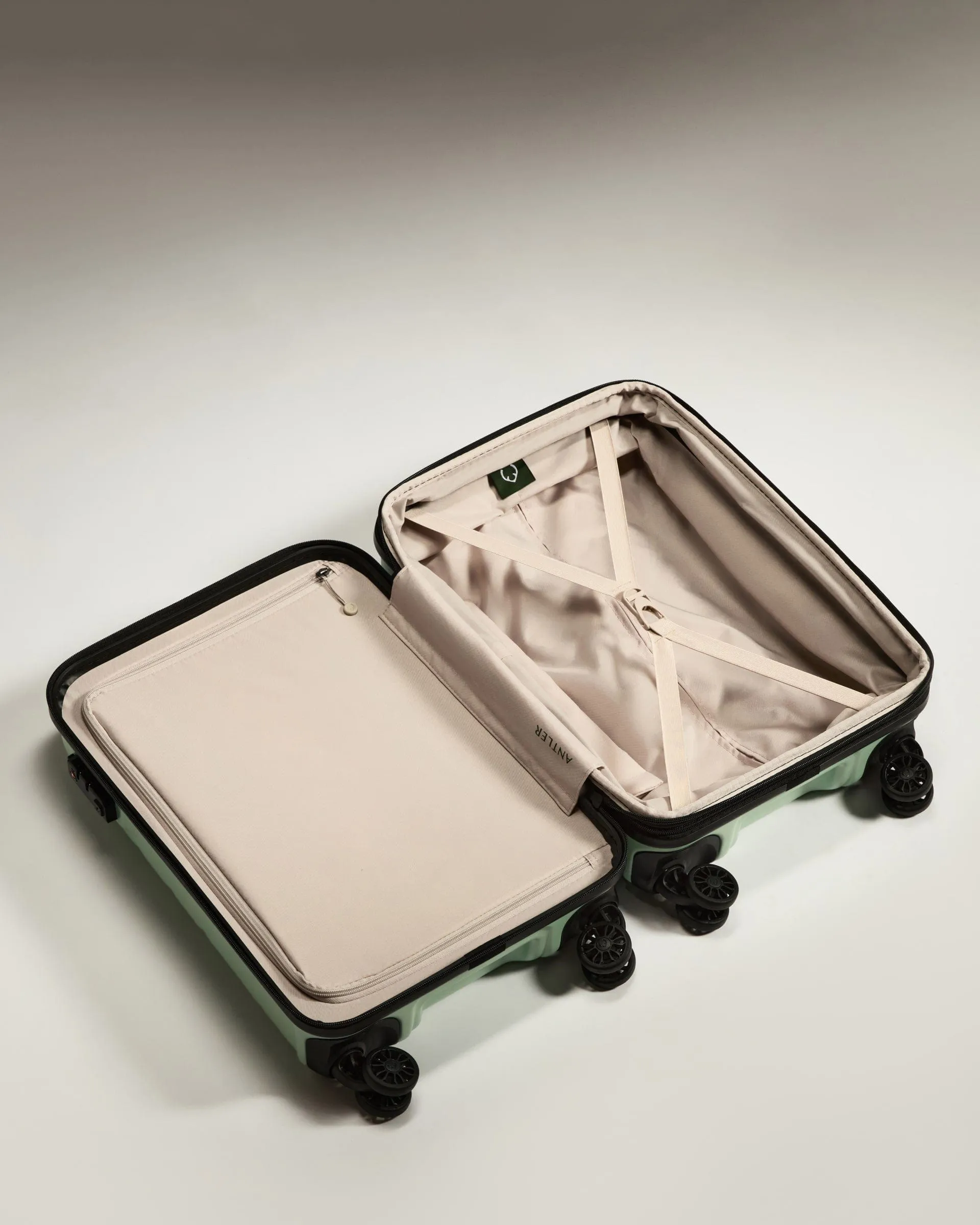 Expandable Cabin Suitcase in Aspen Green - Logo